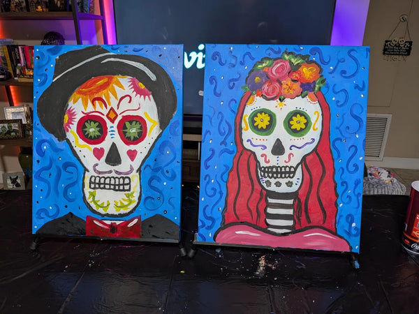 Couple with their finished Life is Sweet sugar skull date night diptych